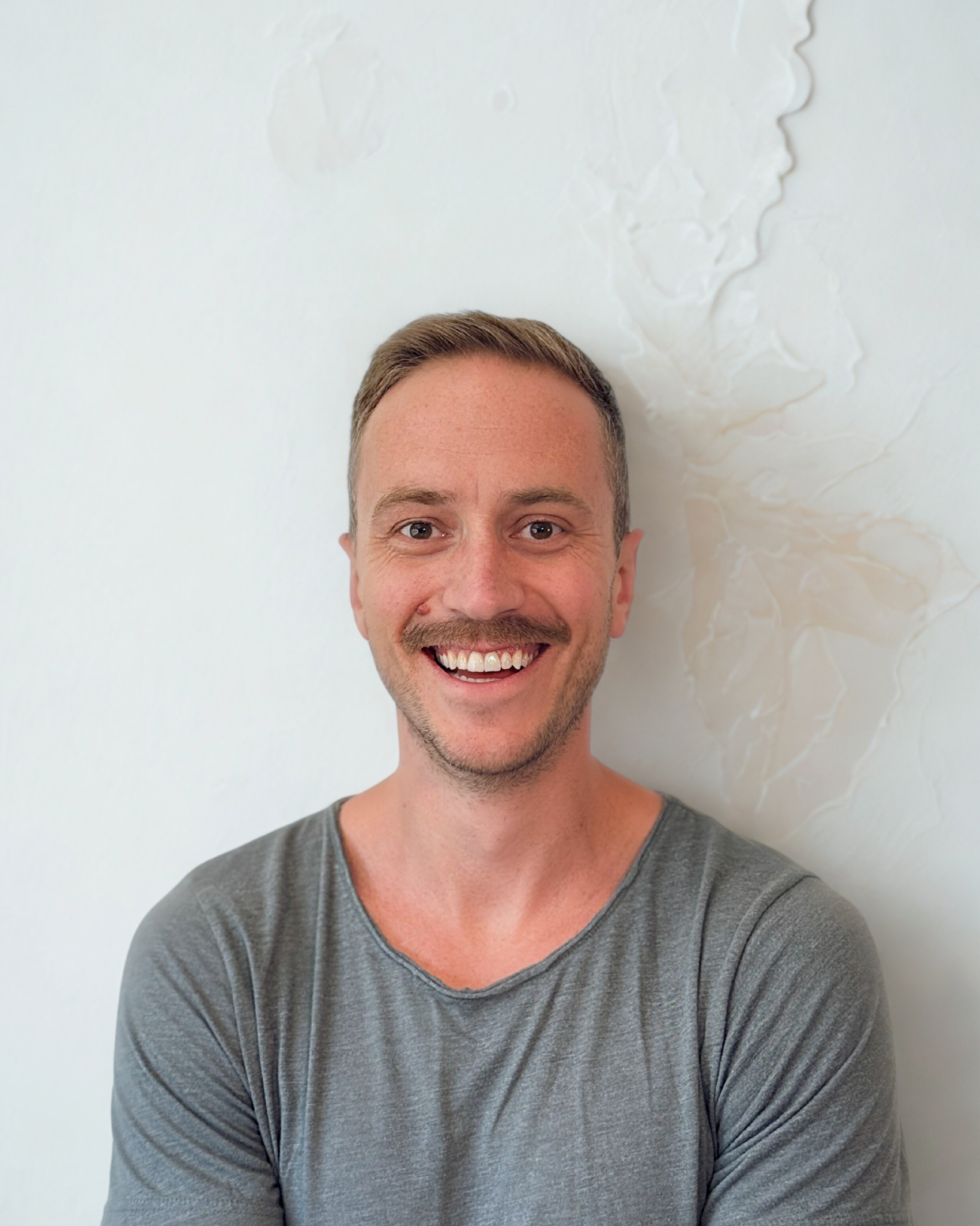 Mike Hammock smiling in a portrait photo